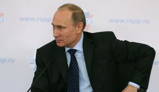 Russia&#39;s President Vladimir Putin attends a congress of the Russian Union of Industrialists and Entrepreneurs in Moscow, Russia, on Thursday, March 20, 2014. (AP Photo/ Sergei Chirikov, pool)