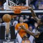Phoenix Suns&#39; Archie Goodwin dunks against the Orlando Magic during the first half of an NBA basketball game, Wednesday, March 19, 2014, in Phoenix. (AP Photo/Matt York)