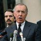 FILE - This May 11, 1989 file photo shows Iran-Contra special prosecutor Lawrence Walsh speaking to reporters outside U.S. District in Washington. Walsh, the Iran-Contra prosecutor who investigated Reagan officials, has died. (AP Photo/Rick Bowmer, File)