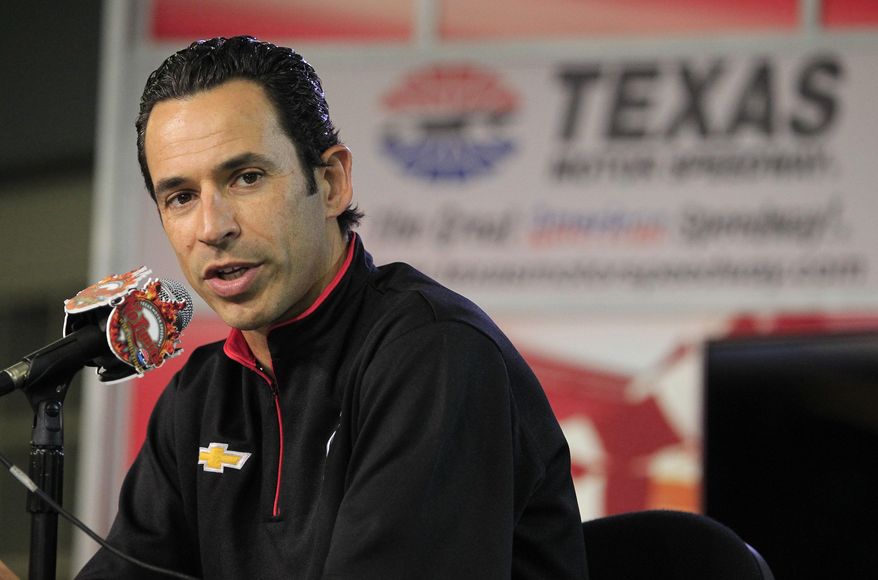 Indycar driver Helio Castroneves speaks at Texas Motor Speedway on Wednesday, March 19, 2014, in Fort Worth, Texas, where a high-definition video board was unveiled. The screen is 218 feet wide and about 95 feet high. It is about 125 feet above ground level in the middle of the backstretch at the 1 1/2-mile track. (AP Photo/Fort Worth Star Telegram, Paul Moseley) MAGS OUT (FORT WORTH WEEKLY, 360 WEST); INTERNET OUT