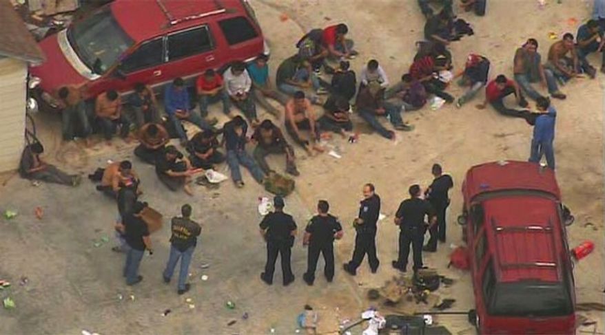 More than 100 suspected illegal immigrants were found being held hostage in a filthy Houston stash house on Wednesday. (AIR 11)