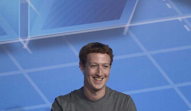 ** FILE ** This Feb. 24, 2014, file photo shows Facebook Chairman and CEO Mark Zuckerberg during a conference in Barcelona, Spain. (AP Photo/Manu Fernandez, File)