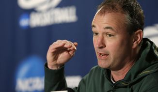 North Dakota State head coach Saul Phillips speaks at a news conference before the third round of the NCAA men&#39;s college basketball tournament in Spokane, Wash., Friday, March 21, 2014. North Dakota State plays San Diego State on Saturday. (AP Photo/Elaine Thompson)