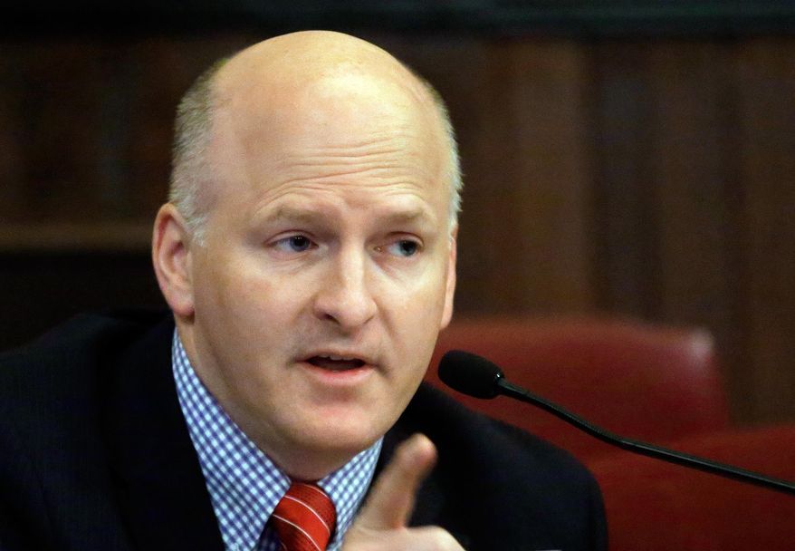 Illinois Sen. Dan Kotowski, D-Park Ridge, speaks to lawmakers during a committee hearing at the Illinois State Capitol March 21, 2014 in Springfield Ill. The heads of several Illinois agencies and universities appear before committee to discuss the potential impact of next year's budget cuts. The state is facing a roughly $1.3 billion cut in spending due to the scheduled roll back of the temporary income tax increase. The meeting comes days before Gov. Pat Quinn is scheduled to give his 2015 budget address. (AP Photo/Seth Perlman)