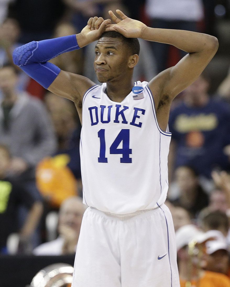 Duke guard Rasheed Sulaimon (14) walks off the court during the second half of an NCAA college basketball second-round game against Mercer, Friday, March 21, 2014, in Raleigh, N.C. Mercer won 78-71. (AP Photo/Chuck Burton)
