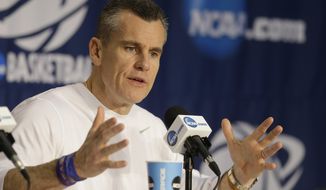Florida coach Billy Donovan speaks during a news conference at the NCAA college basketball tournament Friday, March 21, 2014, in Orlando, Fla. Florida pays  Pittsburgh in a third-round game on Saturday.(AP Photo/John Raoux)