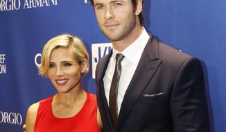 FILE - In this Jan. 11, 2014 file photo, Elsa Pataky, left, and Chris Hemsworth arrive at the 3rd Annual Sean Penn &amp;amp; Friends HELP HAITI HOME Gala at the Montage Hotel in Beverly Hills, Calif. Hemsworth and his wife Pataky have welcomed not one, but two sons. The twins of the 30-year-old “Thor: The Dark World” star and the 37-year-old “Fast and Furious 6” actress were born in Los Angeles, confirmed on Friday, March 21, 2014 by Hemsworth&#39;s publicist, Robin Baum.  (Photo by Colin Young-Wolff /Invision/AP, file)