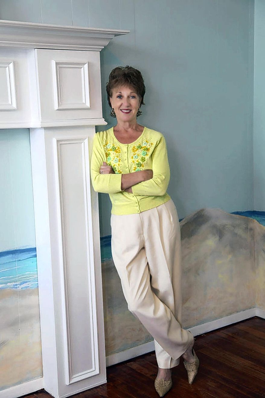 FOR RELEASE SUNDAY, MARCH 23, 2014, AT 12:01 A.M. EDT. - In this photo from March 9, 2014, journalist Deb Richardson-Moore poses for a photo. After more than 25 years as a reporter, Richardson-Moore never wrote that story for The Greenville (S.C.) News. Instead, she wrote a first-person account in "The Weight of Mercy: A Novice Pastor on the City Streets," a book about leaving her newspaper career and living out her new calling as pastor of the Triune Mercy Center. (AP Photo/The Daily Reflector of Greenville, Janet Storm)