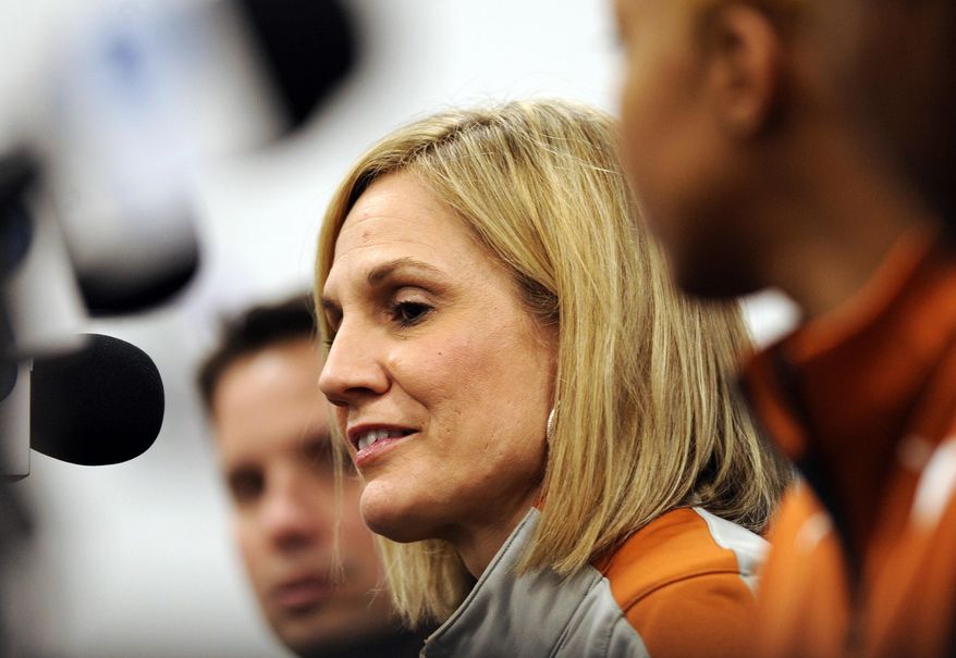 Texas head coach Karen Aston answers questions during a news conference at the NCAA women's college basketball tournament, Saturday, March 22, 2014. in College Park, Md. Texas plays Pennsylvania in first-round game on Sunday. (AP Photo/Gail Burton)