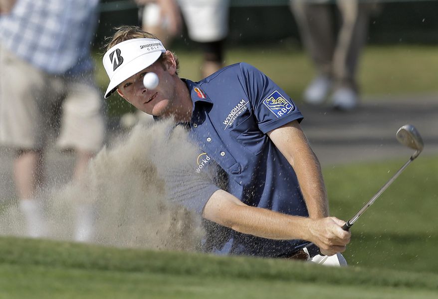 Brandt Snedeker blasts from a sand trap on the 15th hole during the second round of the Arnold Palmer Invitational golf tournament at Bay Hill Friday, March 21, 2014, in Orlando, Fla. (AP Photo/Chris O'Meara)