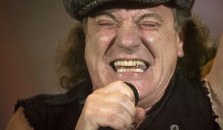 FILE - Brian Johnson, lead singer of Australian rock band AC/DC, performs during a concert at the Hallestadion in Zurich, Switzerland, in this April 6, 2009 file photo. (AP Photo/KEYSTONE/Ennio Leanza, File)