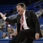 North Carolina State coach Wes Moore gestures to his players during the second half of a first-round game against BYU in the NCAA women&#x27;s college basketball tournament on Saturday, March 22, 2014, in Los Angeles. BYU won 72-57. (AP Photo/Jae C. Hong)
