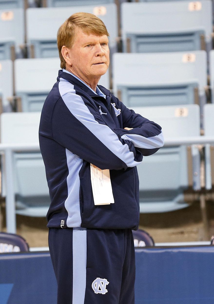 North Carolina Associate Head Coach Andrew Calder watches his team during practice for the NCAA women's college basketball tournament in Chapel Hill, N.C., March 22, 2014. North Carolina plays UT-Martin in a first-round game on Sunday. (AP Photo/Ellen Ozier)
