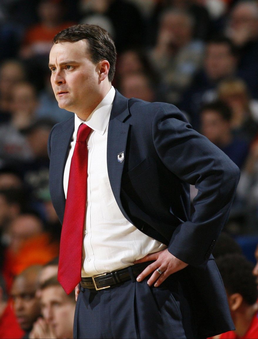 Dayton coach Archie Miller reacts during the first half of a third-round game against Syracuse in the NCAA men&#39;s college basketball tournament in Buffalo, N.Y., Saturday, March 22, 2014. (AP Photo/Bill Wippert)