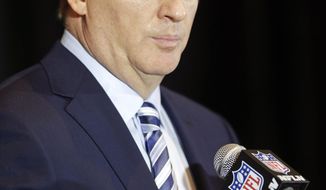 NFL Commissioner Roger Goodell answers questions during a news conference at the NFL football annual meeting in Orlando, Fla., Monday, March 24, 2014. (AP Photo/John Raoux)