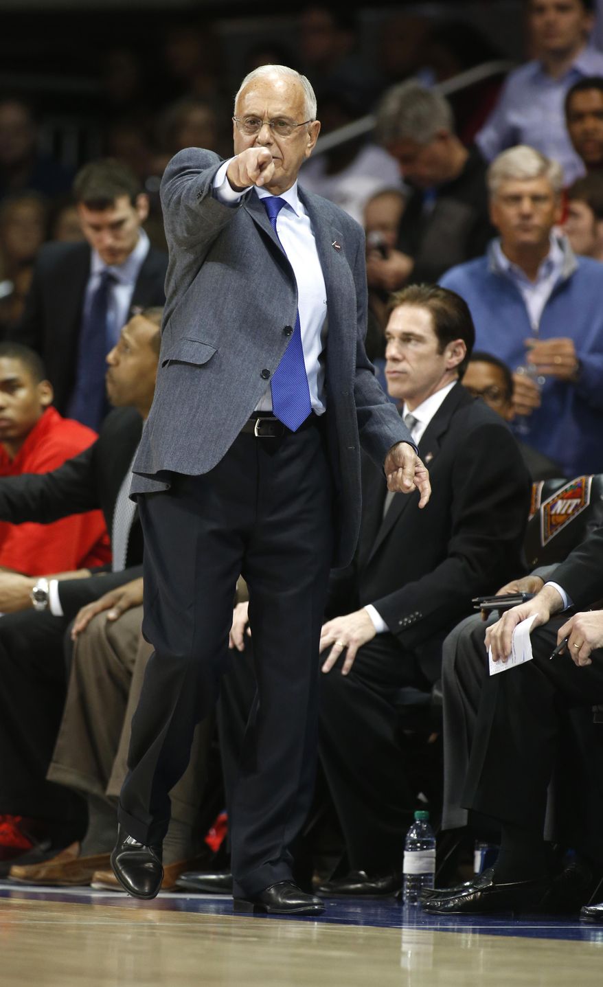 SMU head coach Larry Brown calls a play during the first half of an NCAA college basketball game against LSU in the second round of the NIT Monday, March 24, 2014, in Dallas, Texas. (AP Photo/Sharon Ellman)