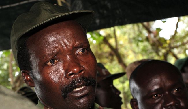 The leader of the Lord&#x27;s Resistance Army, Joseph Kony answers journalists&#x27; questions following a meeting with U.N. humanitarian chief Jan Egeland at Ri-Kwamba in southern Sudan. (AP Photo/Stuart Price, Pool, File)