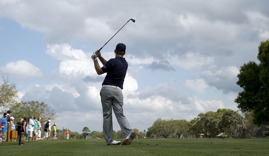 Matt Every follows the flight of his tee shot on the 13th hole during the final round of the Arnold Palmer Invitational golf tournament at Bay Hill, Sunday, March 23, 2014, in Orlando, Fla. Every won the tournament. (AP Photo/Willie J. Allen Jr.)