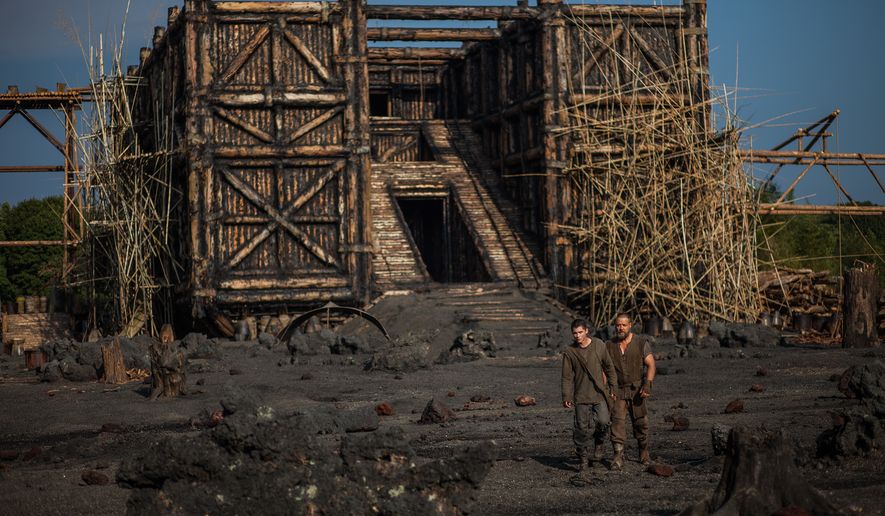 This image released by Paramount Pictures shows Logan Lerman, left, and Russell Crowe in a scene from &quot;Noah.&quot; (AP Photo/Paramount Pictures, Niko Tavernise)