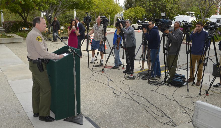 Los Angeles Sheriff's Department commander Mike Parker, right, speaks during a news conference, Tuesday, March 25, 2014, in Los Angeles, about the death of actor Paul Walker and his friend Roger Rodas. The Porsche carrying "Fast & Furious" star Walker was traveling up to 94 mph when it went out of control on a suburban street and crashed, killing the actor and his friend, according to an investigation by law enforcement agencies into the November accident. The sports car driven by Rodas slammed into a light pole with a 45 mph speed limit sign and burst into flames. Walker and Rodas died at the scene. (AP Photo/Mark J. Terrill)