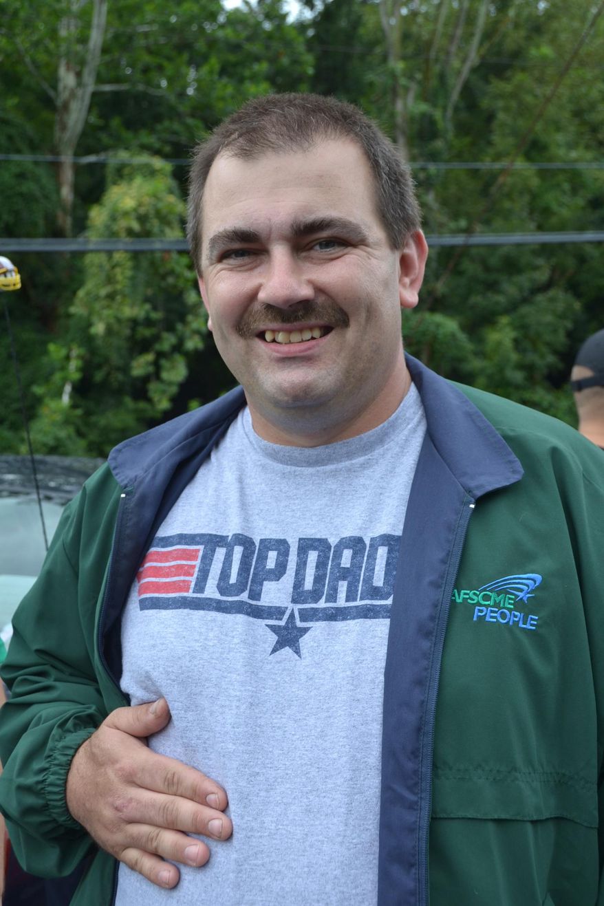 This Aug. 9, 2013, photo shows Maryland Correctional Officer Herbert Hilliard in Cumberland, Md. Hilliard was stabbed by an inmate at North Branch Correctional Institution on Aug. 5, 2013. Richard Crawford, was already serving life plus 30 years for killing his parents in Prince George’s County in 1993 and stabbing an officer at another prison in 2007. Crawford had 20 years added to his sentence Tuesday, March 25, 2014, for stabbing Hilliard. (AP Photo/Cumberland Times-News, Ken Nolan) WHAG-TV OUT
