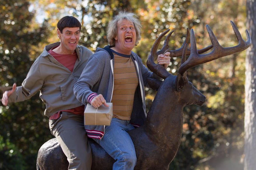 This image released by Universal Pictures shows Jim Carrey, left, and Jeff Daniels in a scene from the upcoming sequel to "Dumb and Dumber," called "Dumb and Dumber To." The comedy is scheduled for release on November 14 of this year. (AP Photo/Universal Pictures, Hopper Stone)