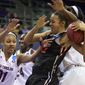 Oregon State forward Deven Hunter (32) is fouled as South Carolina&#39;s Asia Dozier (31) goes for the ball during the first half of a second-round game of the NCAA women&#39;s college basketball tournament, Tuesday, March 25, 2014, in Seattle. (AP Photo/The Oregonian, Randy L Rasmussen) MAGS OUT, TV OUT, LOCAL TV AND INTERNET OUT, (THE MERCURY, WILLAMETTE WEEK, PAMPLIN MEDIA GROUP OUT)