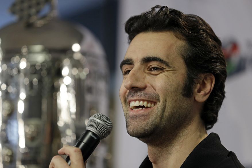 FILE - In this Dec. 19, 2013 file photo, Dario Franchitti, of Scotland, answers a question during a press conference in Indianapolis. Three-time Indianapolis 500 winner Franchitti will drive the pace car in the 98th running of the Indy 500 in May. "It is a tremendous honor for me to be asked to drive the pace car for the Indianapolis 500," said Franchitti. (AP Photo/Michael Conroy, File)