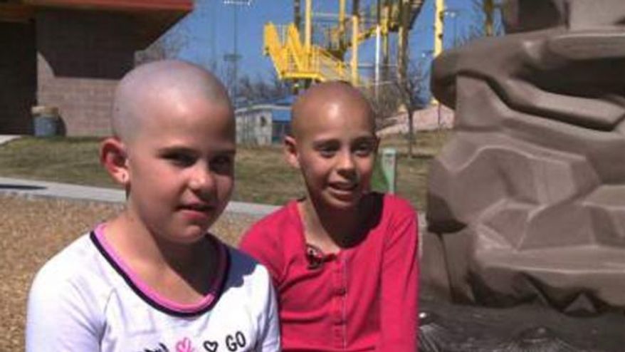 Kamryn Renfro, left, was barred from school after shaving her head to support her friend, Delaney Clements, 11, who is undergoing chemotherapy to treat cancer. (Fox 31 Denver)