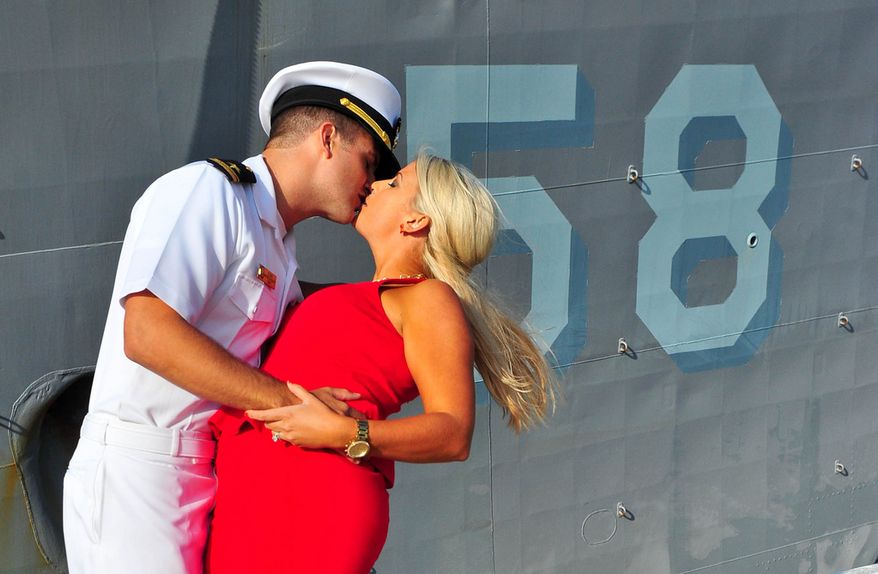Lt. j.g. Kyle Chance kisses his wife after returning to Naval Station Mayport from a six-month deployment aboard the guided-missile frigate USS Samuel B. Roberts (FFG 58). Samuel B. Roberts deployed to the U.S. 6th Fleet Area of Responsibility in April 2013 to support maritime security operations, theater security cooperation and Operation Active Endeavor. (U.S. Navy photo by Mass Communication 2nd Class Marcus L. Stanley/Released)