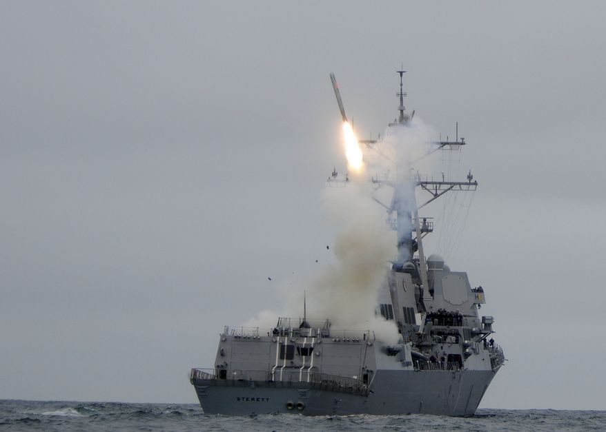 ** FILE ** The guided-missile destroyer USS Sterett (DDG 104) successfully launches its second Tomahawk missile during weapons testing. (U.S. Navy photo)