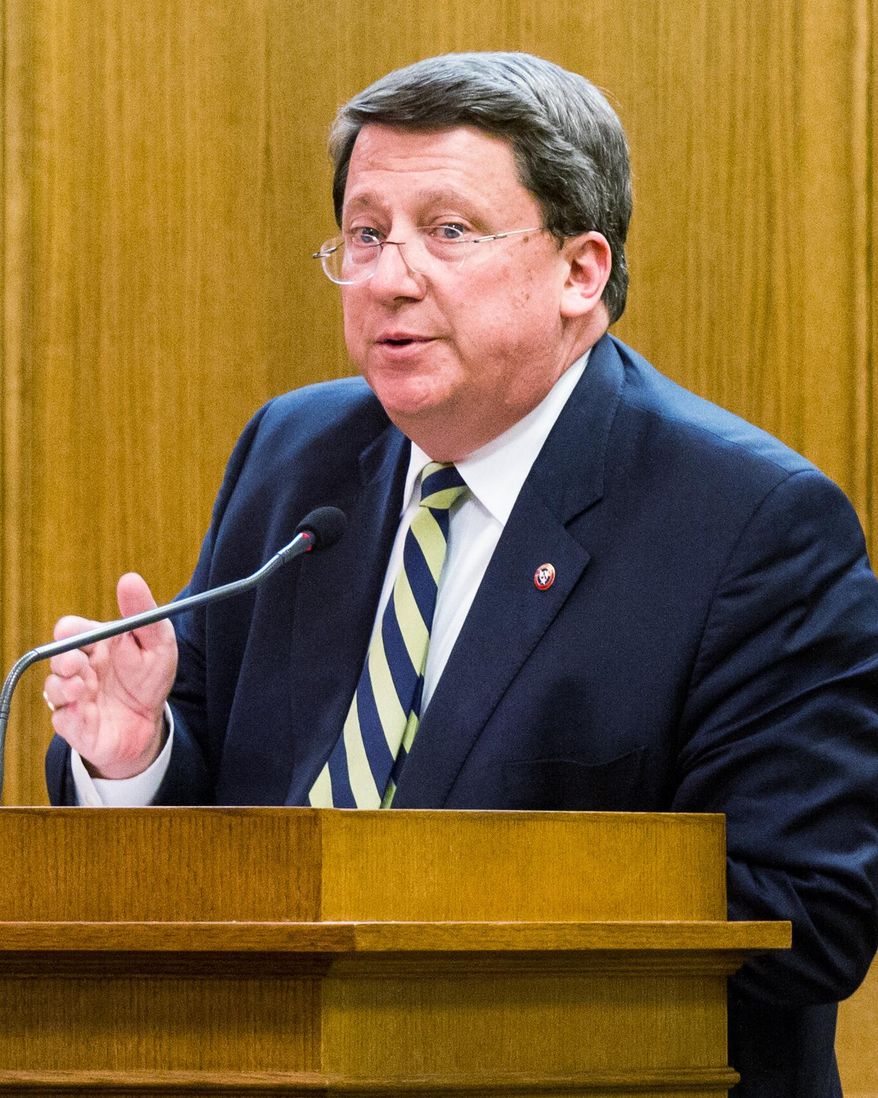 Senate Majority Leader Mark Norris, R-Collierville, addresses the Senate Education Committee in Nashville, Tenn., on Wednesday, March 26, 2014. The panel later advanced Gov. Bill Haslam's proposal to create a limited school voucher program in Tennessee. (AP Photo/Erik Schelzig)