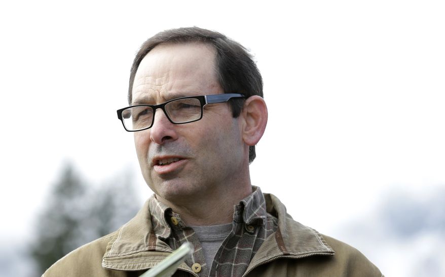 Dan Rankin, mayor of Darrington, Wash., talks to reporters Wednesday, March 26, 2014, in Darrington, Wash. The town of Darrington has been hit hard the massive mudslide that struck Saturday, killing at least 16 and leaving dozens missing. (AP Photo/Ted S. Warren)