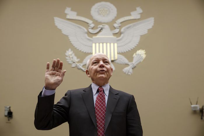 Internal Revenue Service Commissioner John Koskinen is sworn in on Capitol Hill in Washington, Wednesday, March 26, 2014, prior to testifying before the House Oversight Committee hearing probing whether tea party groups were improperly targeted for increased scrutiny by the government&amp;#8217;s tax agency. Earlier this month, IRS official Lois Lerner was called to testify about the controversy but refused to answer questions by committee Chairman Darrell Issa, R-Calif., and invoked her Fifth Amendment rights at least nine times. (AP Photo/J. Scott Applewhite)