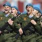** FILE ** Russian paratroopers march during the Victory Day Parade, which commemorates the 1945 defeat of Nazi Germany in Moscow, Russia, May 9, 2011. (Associated Press) 