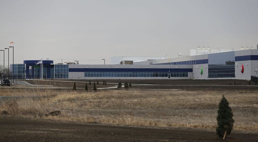This Wednesday, March 26, 2014 photograph shows the new Mars Inc. production facility near Topeka, Kan. It&#39;s the company&#39;s first new North American production facility in 35 years. (AP Photo/Orlin Wagner)