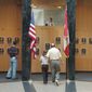 This April 30, 2004 file photo shows museum patrons viewing plaques of recent inductees into the National Baseball Hall of Fame and Museum in Cooperstown, N.Y.  There are many destinations of interest to baseball fans around the country outside ballparks from museums and statues to historic homes. (AP Photo/Tim Roske, File)
