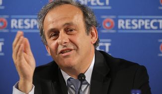 FILE - In this Saturday, Feb 22, 2014 file photo UEFA President Michel Platini  speaks during a press conference, one day prior to the UEFA EURO 2016 qualifying draw at the Acropolis Convention Centre in Nice, southeastern France. Seeking to bolster national team football amid the rampant success of club competitions, UEFA’s 54 member countries voted Thursday to create the Nations League. UEFA boosted the new event by guaranteeing it would feed into qualifying for the 2020 European Championship. It could later be incorporated into European qualifying for the 2022 World Cup. “This is a very important decision for the future of football at the level of national teams,” UEFA President Michel Platini said Thursday after the unanimous vote at European football’s annual congress.. (AP Photo/Lionel Cironneau, File)