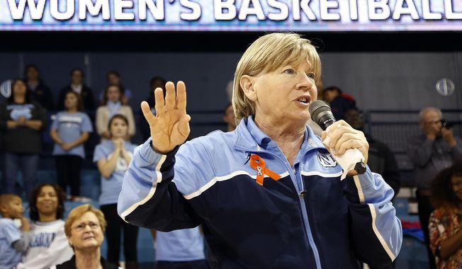 FILE - In this Jan. 5, 2014 file photo, North Carolina head coach Sylvia Hatchell addresses the crowd at halftime of an NCAA women's college basketball game against Maryland, in Chapel Hill, N.C. Hatchell says she could return to coaching while battling leukemia if the Tar Heels reach the Final Four. Fourth-seeded UNC  faces No. 1 seed South Carolina in California at this weekend's Stanford Regional. If her team advances, Hatchell said Thursday, March 27, 2014, her doctor has told her that being on the sideline in Nashville, Tenn., is "very doable." (AP Photo/Ellen Ozier, File)