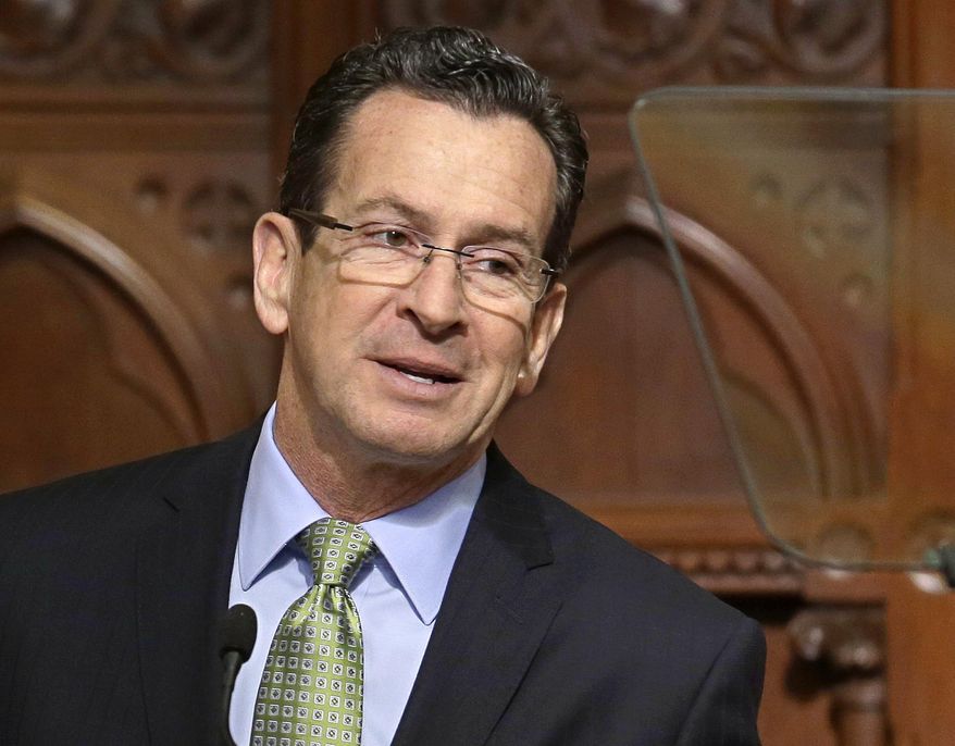 FILE - In this Feb. 6, 2014 file photo, Connecticut Gov. Dannel P. Malloy delivers his 2014 State of the State address before a joint session of the legislature in the House Chambers at the Capitol in Hartford, Conn. Malloy announced his intention to seek a second term Friday, March 28, 2014 following a meeting of the State Bond Commission. Malloy said that he and Lt. Gov. Nancy Wyman made a "mutual decision" to run again. He previously said he would unveil his decision after the legislative session adjourns in May. (AP Photo/Stephan Savoia, File)