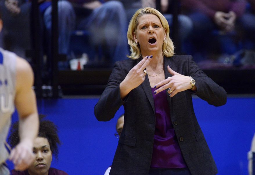 Minnesota head coach, Pam Borton leads her team as they play South Dakota State in Thursday's 3rd round WNIT basketball game at Frost Arena in Brookings, S.D. March 27, 2014. SDSU beat Minnesota 70-62.(AP Photo/Argus Leader, Elisha Page) NO SALES
