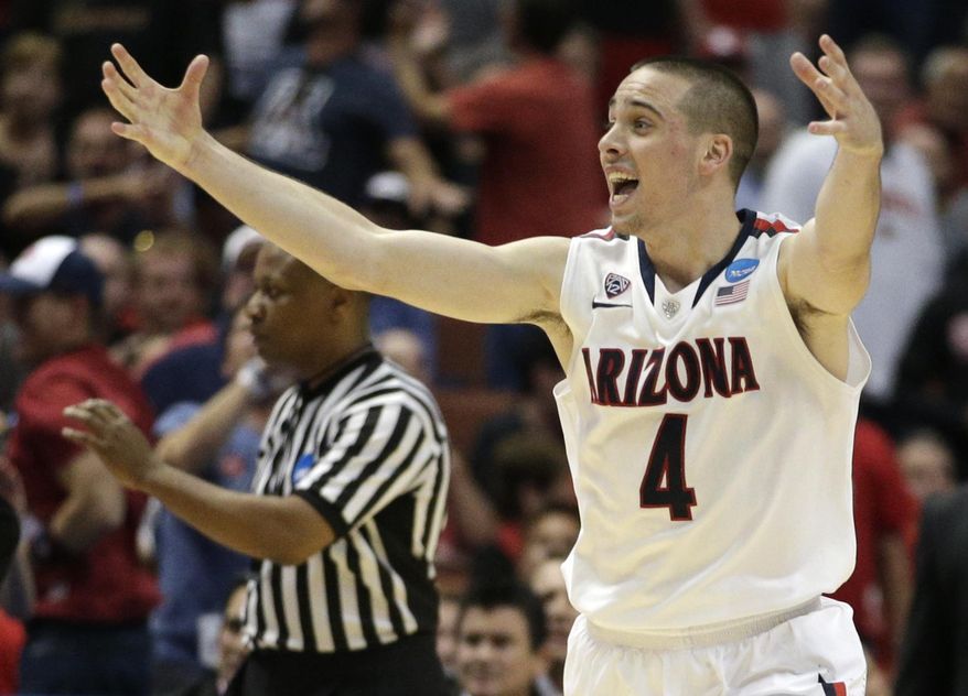 Arizona guard T.J. McConnell (4) celebrates against San Diego State during the second half in a regional semifinal NCAA college basketball tournament game, Thursday, March 27, 2014, in Anaheim, Calif. (AP Photo/Jae C. Hong)