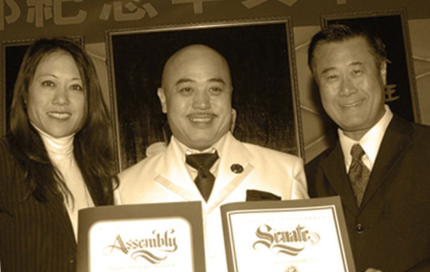 In this March 2011 photo, Raymond "Shrimp Boy" Chow, center, poses with state Senator Leland Yee, right, and state Assembly member Fiona Ma, left, at the Chee Kung Tong spring banquet in San Francisco. Investigators say Chow is the leader and the dragonhead of one of the most powerful Asian gangs in North America. Chow's gang is said to have lured state Sen. Leland Yee into its clutches through money and campaign contributions in exchange for legislative help, as Yee sought to build his campaign coffers to run for California secretary of state. Born in Hong Kong in 1960, Chow came to the United States at 16 and was reportedly nicknamed "Shrimp Boy" by his grandmother, in part due to his small stature. (AP Photo/Sing Tao Daily)