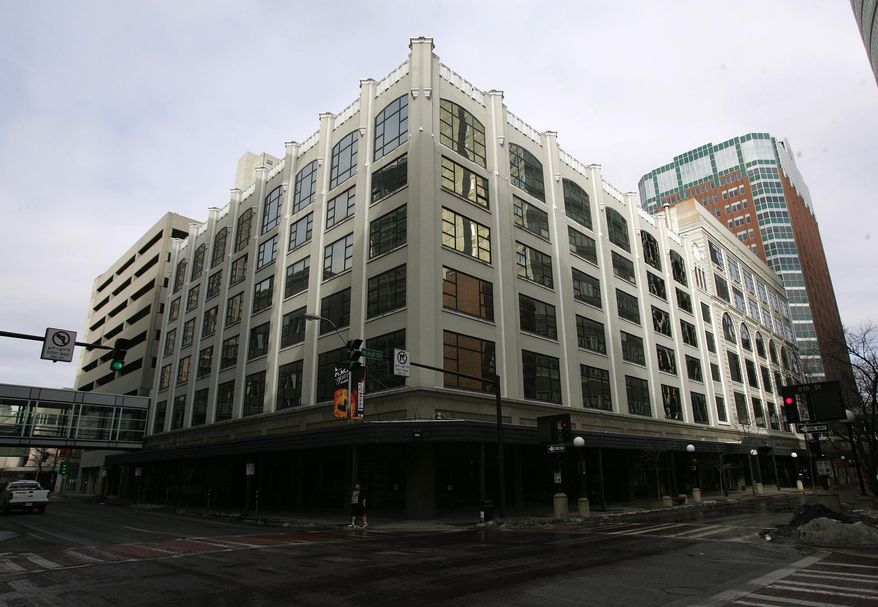 In this Feb. 15, 2011 photo, the Younkers building in downtown Des Moines, Iowa is shown. A massive fire swept through the century-old building that was being renovated, causing its upper floors to collapse and authorities to close down numerous streets in downtown Des Moines. No one was injured. Des Moines Fire Department spokesman Brian O'Keefe said it first got word of a fire at the former Younkers department store building at about 12:50 a.m. Saturday, and arrived to find flames leaping from the upper floors of the seven-floor building, which dates to 1899. (AP Photo/The Des Moines Register, Arturo Fernandez) MANDATORY CREDIT THE DES MOINES REGISTER