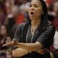 South Carolina head coach Dawn Staley talks to an official during the first half of a regional semifinal game against North Carolina at the NCAA college basketball tournament in Stanford, Calif., Sunday, March 30, 2014. (AP Photo/Jeff Chiu)