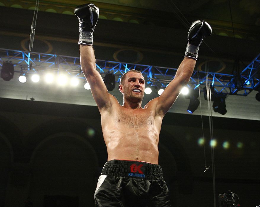 Sergey Kovalev, of Russia, reacts after defeating Cedric Agnew, of the United States, by knockout in the seventh round of WBO light heavyweight championship boxing match in Atlantic City, N.J. on Saturday, March 29, 2014. (AP Photo/Tim Larsen)
