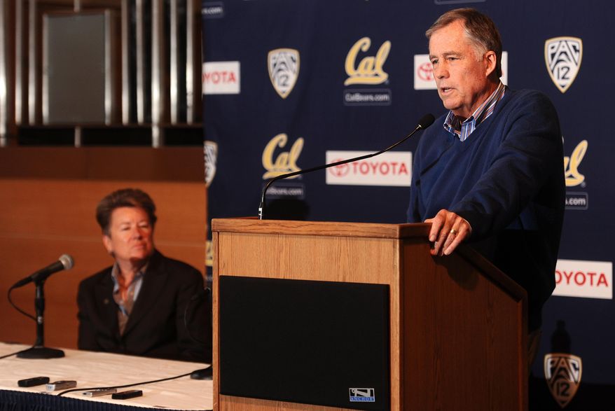 Mike Montgomery, head coach of the California basketball team, discusses his retirement during a news conference Monday, March 31, 2014, in Berkeley, Calif. At left is athletics director Sandy Barbour. (AP Photo/Noah Berger)