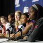 Stanford forward Chiney Ogwumike, right, joins the rest of the team&#39;s starters during a news conference at the NCAA college basketball tournament on Monday, March 31, 2014, in Stanford, Calif. Stanford plays North Carolina in a regional final on Tuesday. (AP Photo/Marcio Jose Sanchez)