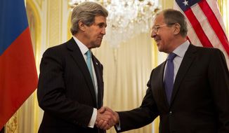 U.S. Secretary of State John Kerry, left, shakes hands with Russian Foreign Minister Sergey Lavrov before the start of their meeting at the Russian Ambassador&#x27;s residence about the situation in Ukraine, in Paris Sunday March 30, 2014. Kerry traveled to Paris for a last minute meeting with Lavrov. (AP Photo/Jacquelyn Martin, Pool)