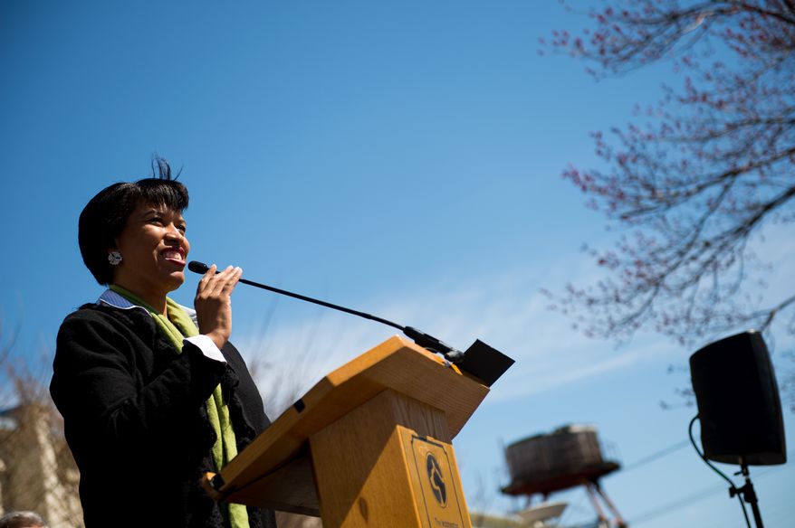 Mayoral candidate Councilmember Muriel Bowser (D-Ward 4) attends a Washington Animal Rescue League 100th Anniversary Celebration, Washington, D.C., Monday, March 31, 2014. (Andrew Harnik/The Washington Times)